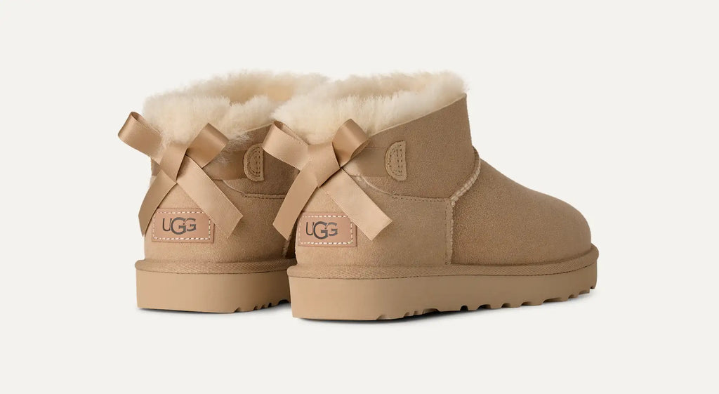 UGG Stivali Ultra Mini Bailey Bow Donna in Sand