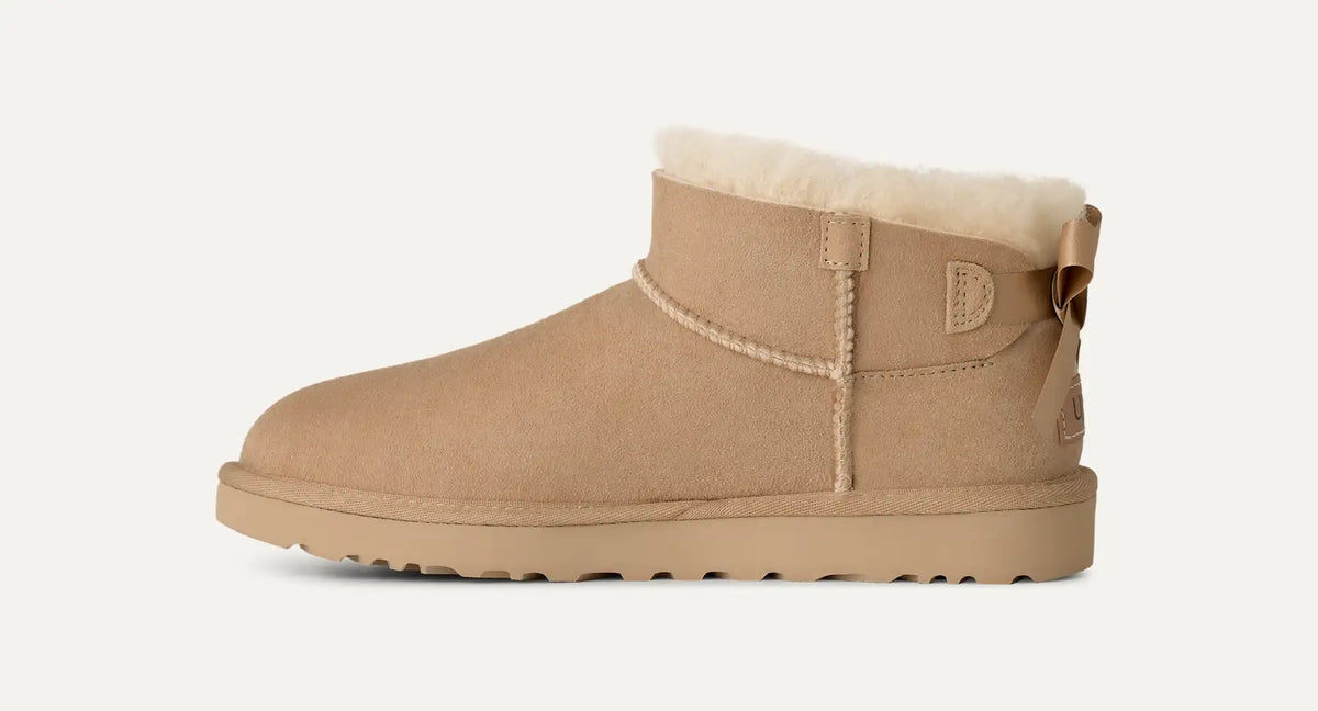 UGG Stivali Ultra Mini Bailey Bow Donna in Sand