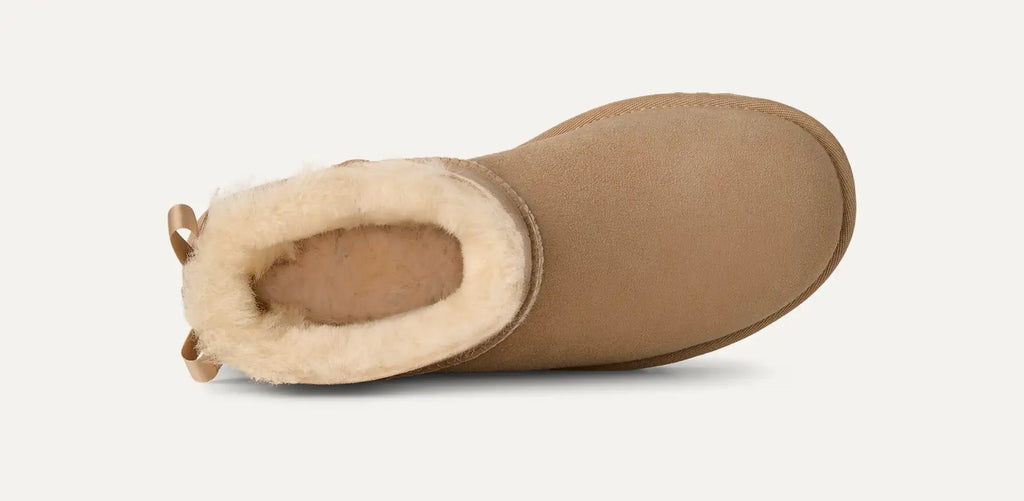 UGG Stivali Ultra Mini Bailey Bow Donna in Sand