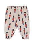 Pantaloni da tuta Little Tin Soldiers per neonato Bobo Choses beige con logo ricamato sul lato – Accessorio premium elegante