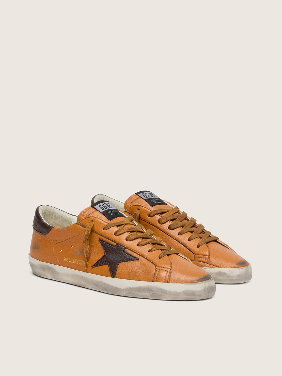 Golden Goose Super-Star Ltd Uomo in Pelle Arancione con Stella Marrone