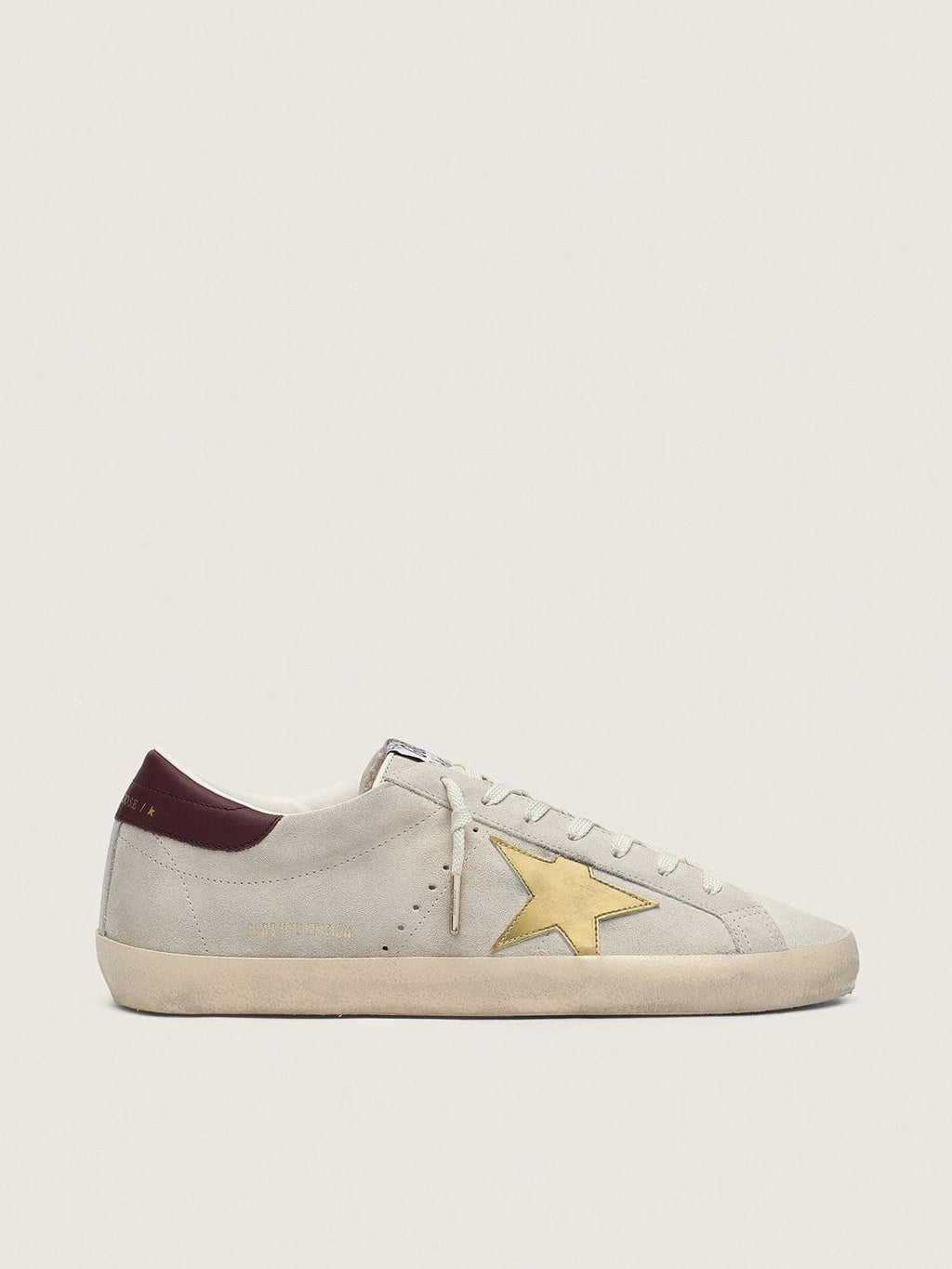 Golden Goose Super-Star Uomo Cny in Suede Avorio con Stella in Pelle Laminata e e Talloncino in Pelle