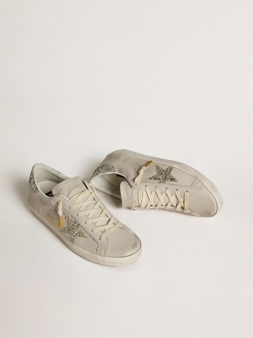 Golden Goose Super-Star Donna  in Nappa Avorio con Stella e Talloncino in Glitter Platino