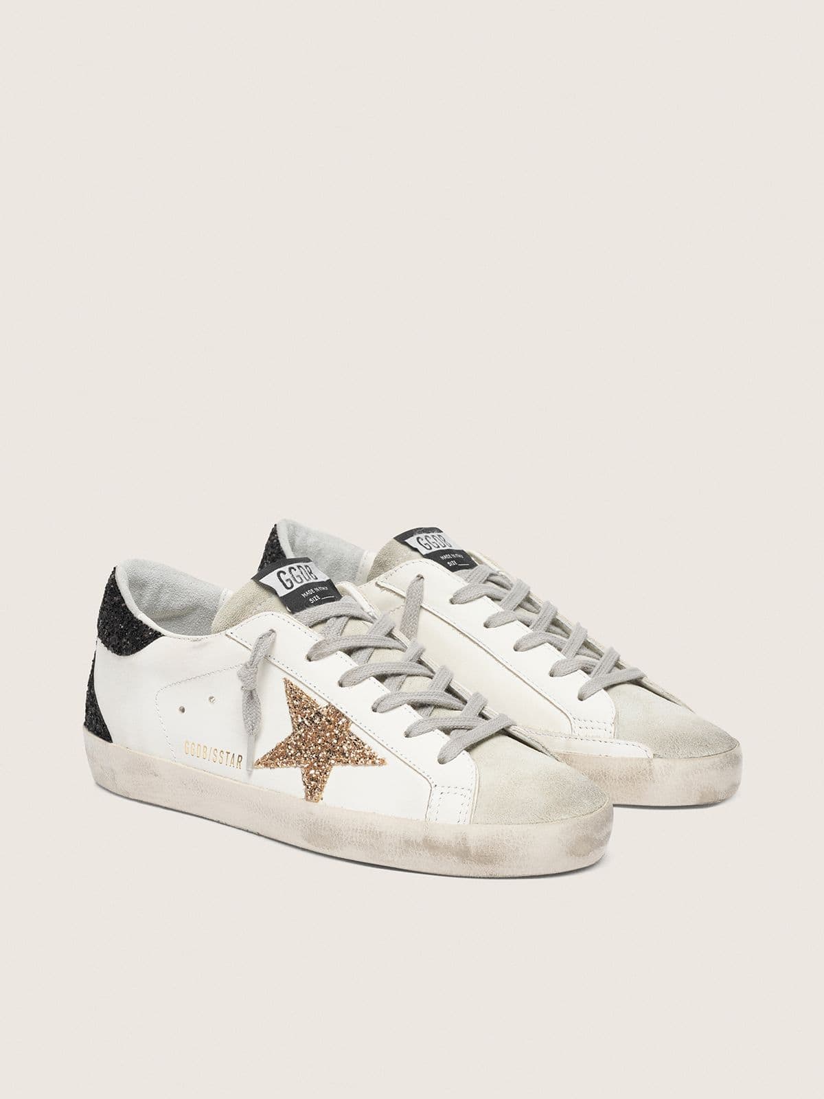 Golden Goose Super-Star Donna in Nappa con Stella in Glitter Oro e Talloncino in Glitter Nero