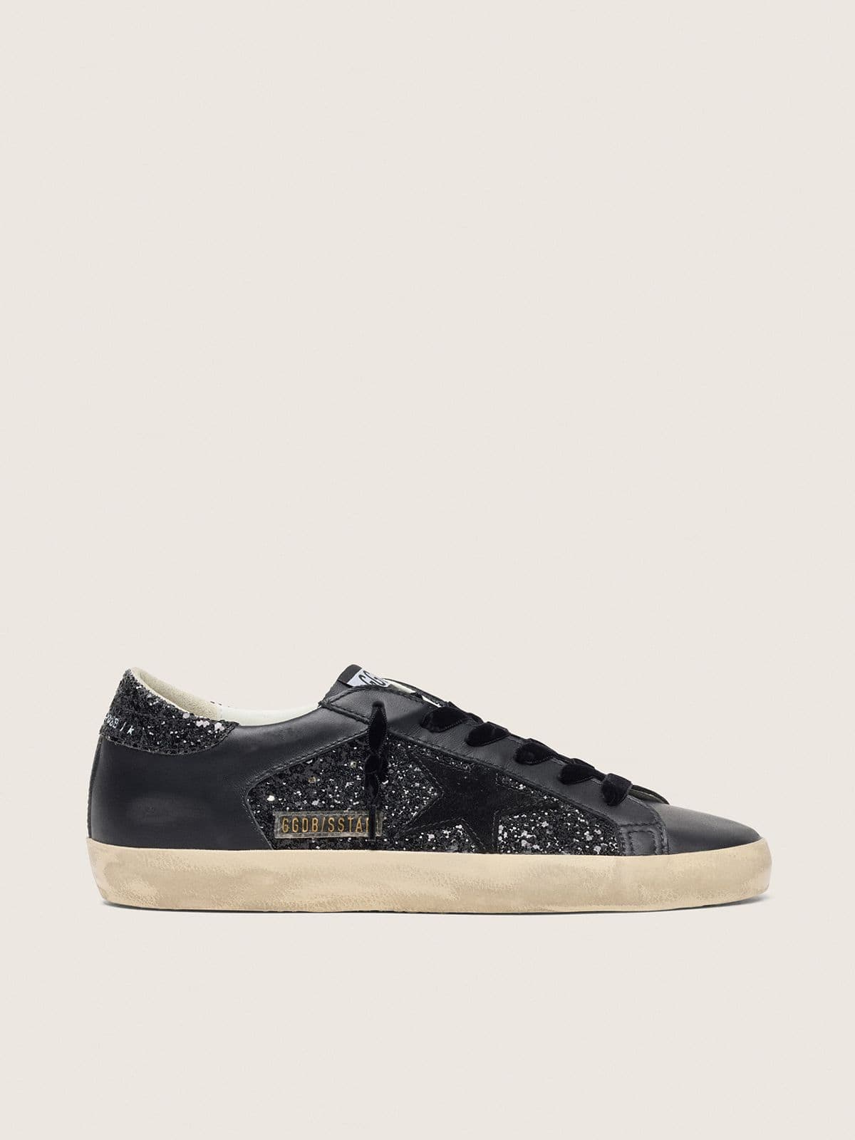 Golden Goose Super-Star Donna in Glitter Neri con Stella in Suede Nero e Inserti in Pelle