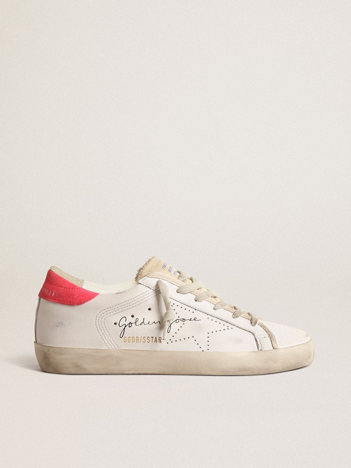 Golden Goose Super-Star Donna in Pelle Bianca con Stella Traforata e Talloncino in Nylon Fucsia