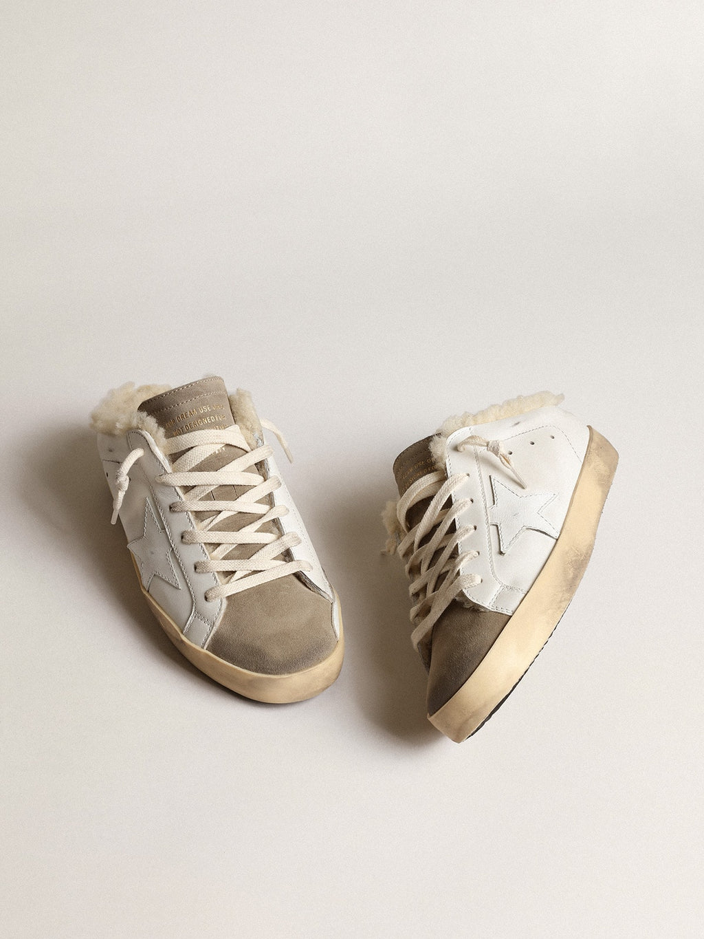 Golden Goose Super-Star Sabot con Stella in Pelle Bianca e Fodera in Shearling