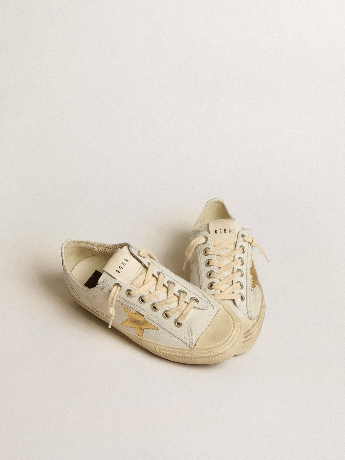 Golden Goose V Star in Pelle Bianca con Stella in Pelle Laminata Dorata