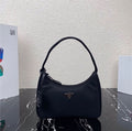 PRADA MINI BORSA IN RE-NYLON – Accessorio premium elegante
