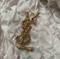Broche Yves Saint Laurent – Accessorio premium elegante
