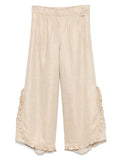 Pantaloni Pipp per bambina Donsje beige con trama metallizzata – Accessorio premium elegante