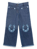 Jeans per bambina Stella McCartney Kids  in denim blu con applicazione sul davanti – Accessorio premium elegante