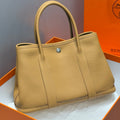 Hermes Garden Party 30cm Milk Tea Silver Buckle Calfskin 255793 – Accessorio premium elegante